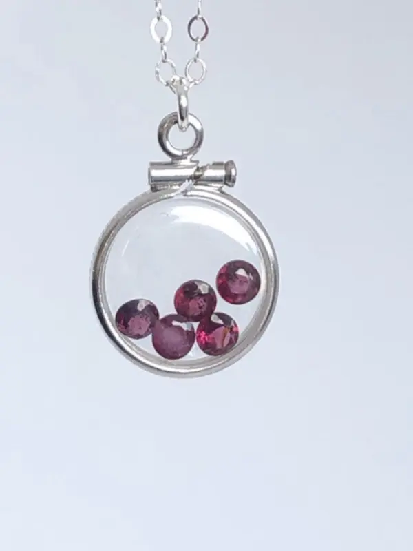 12.5 mm Handmade sterling silver shaker locket with 0.85 TCW of genuine garnets