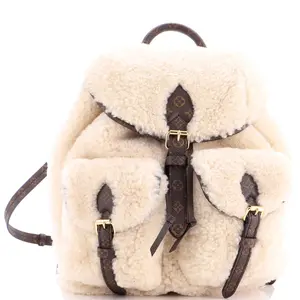 Pre-owned Louis Vuitton Canvas Coated, Shearling Backpacks LV Ski Backpack Shearling and Monogram Canvas by Rebag