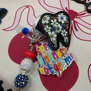 Live claim - interchangeable badge reel