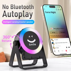 Wireless Induction Speaker with Bluetooth RGB Ambient Light Adjustable Phone Stand 360° Rotatable No Pairing Needed Compatible with iPhone iPad Android Samsung Galaxy Black Audio Device Electronic Gadget Holder Round Smartphone Streaming