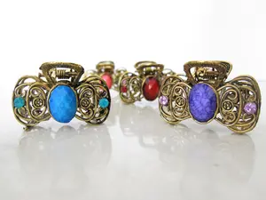 Small bow shaped jeweled antique bronze hair claw clip