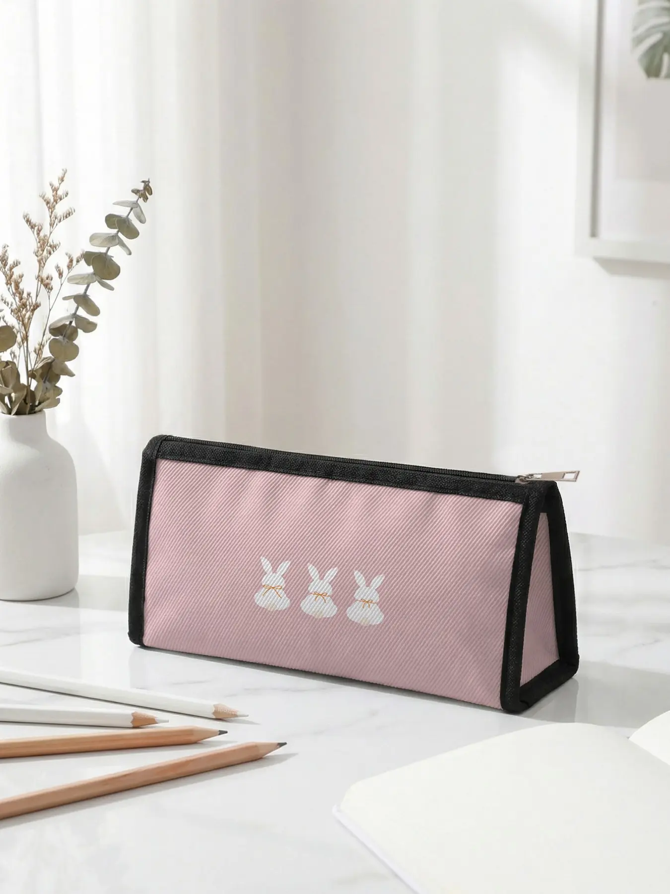 1 piece of Easter limited edition pencil case with 2D printed white rabbit pattern, ergonomic triangular capacity for portable size | Perfect for students in class/office organization, combines festive atmosphere with practicality