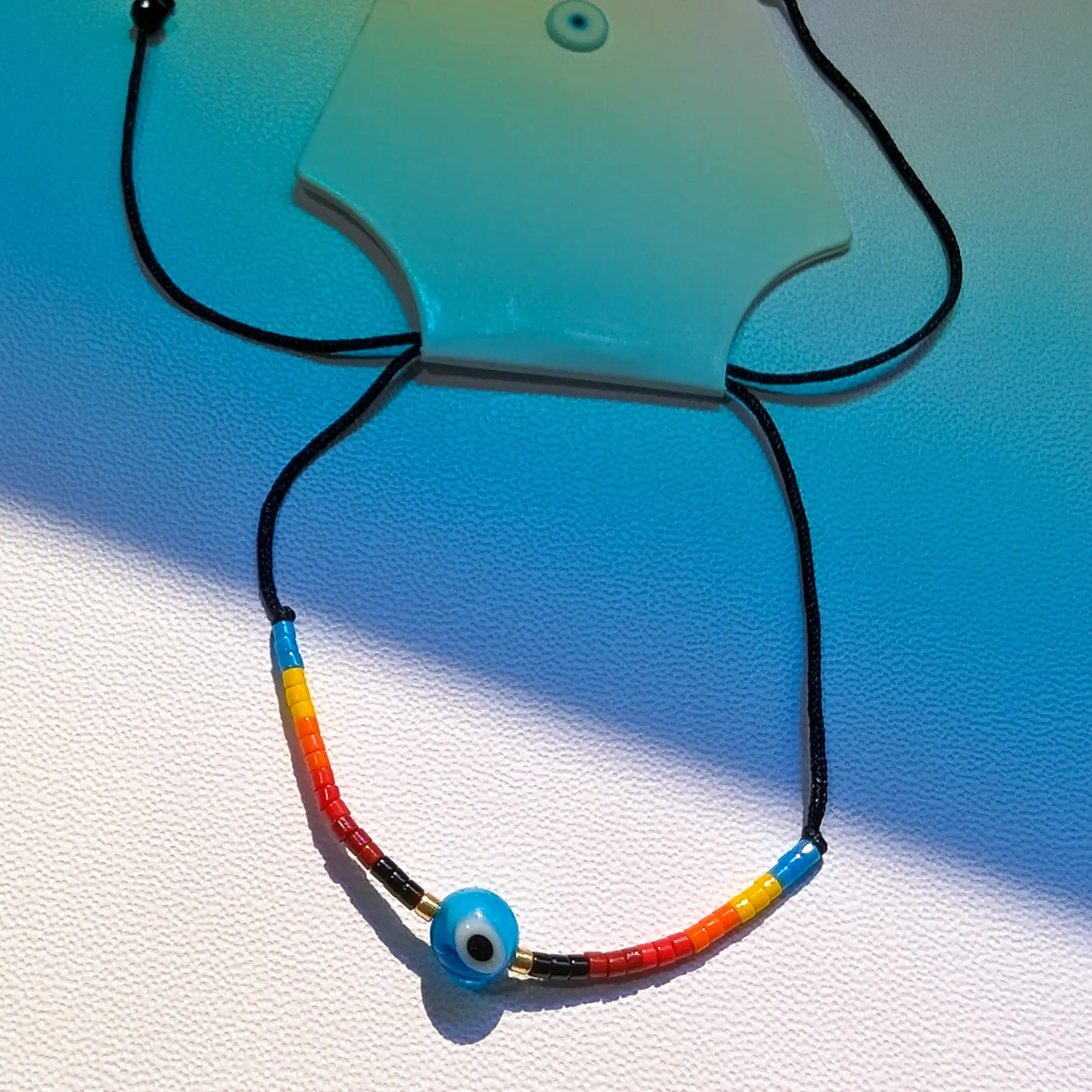 Lil Bluey Glass Chromatic Evil Eye Bracelet: beaded, minimalist, boho