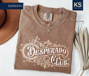 [Sale Up To 43%] The Desperado Club Comfort Colors T-Shirt, New Achievement Carl Shirt, Fantasy Booktok Gift, Dungeon Crawler Carl Tee
