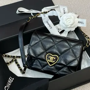 Pre-owned CHANEL Leather Crossbody Bags Coco Quilted Crossbody Bag with Gold Heart CC Black