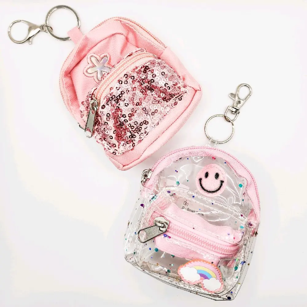 Cute Mini Bookbag Keychains with Sparkly Accents and Playful Details Perfect for Carrying Small Essentials on the Go