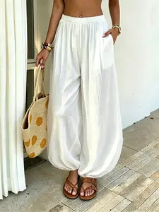 Women's white Harem Pants, Elastic Waist, Loose Fit, Long Pants with Pockets, Bohemian, Suitable for Beach and Casual Wear.