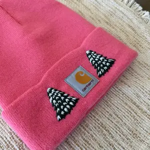 Carhartt (youth) Pine Tree Beanie in Light Pink with Embroidered Tree Design
