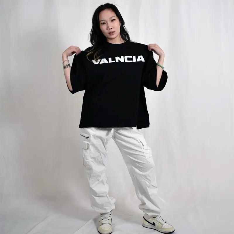 VALNCIA Black Cropped Chrome Tee — “V”