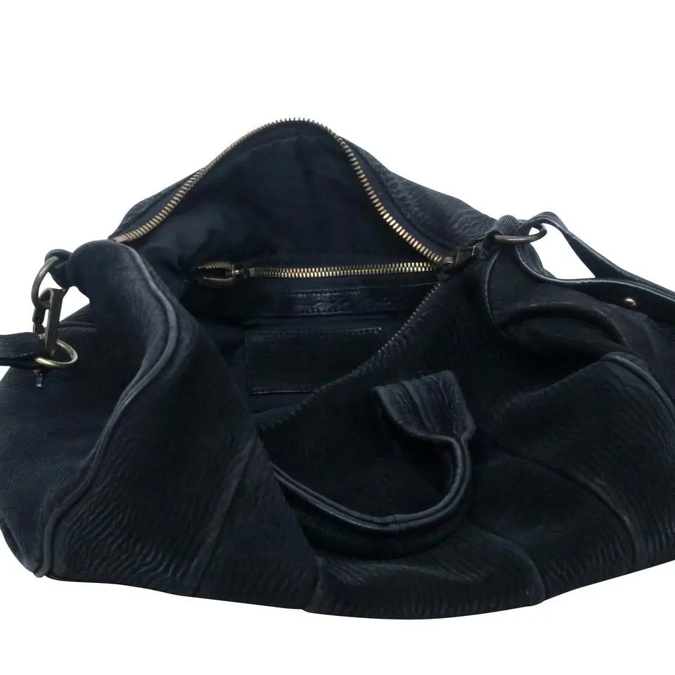 The Alexander Wang Duffle Pebbled Rocco Stud-bottom Black Leather
