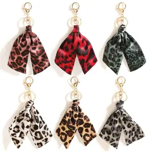 1pc Satin Leopard Print Twisted Keychain, Purse Charm, Boho Casual Cute Elegant Chic Street Bohemia Zinc Alloy, Suitable For All Seasons Car Accessories Bag Charm School