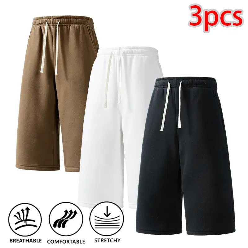 Men’s three-quarter jogger sweatpants, loose knee-length knit joggers with a stretchy drawstring waist, suitable for everyday streetwear outings.