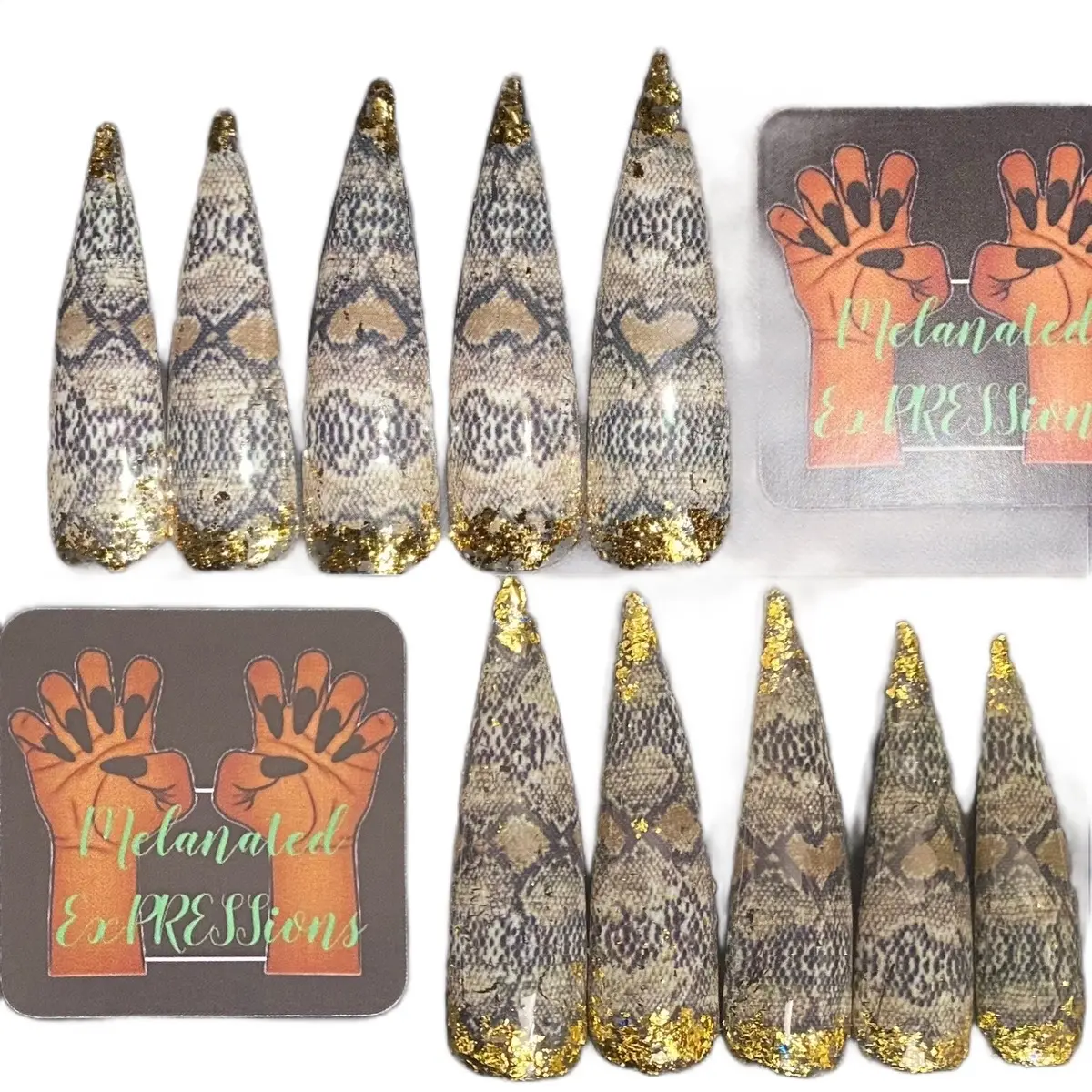 Melanated Expressions Black/White Snakeskin Print Curved Stiletto Shape Double XLong Nails with Gold Tip and Cuticle Accents