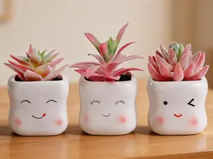 4-piece set of potted purple artificial succulents. Mini realistic faux plants, ideal for desks, windowsills, bathrooms, bedrooms and office decor.