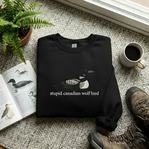 [Made In USA] Canadian Wolf Bird Graphic Sweatshirt, Stupid Loon Illustration, Casual Wildlife T-Shirt, Fun and Playful Design for Nature Enthusiasts