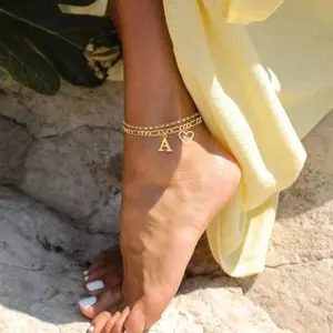 Double-Layer 26-Letter Gold Chain Heart-Shaped Anklet with a heart-shaped pendant; featuring an adjustable design, it is perfect for women.It’s a summer must-have and an ideal Valentine’s Day gift.