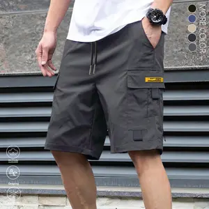 LIFE KEEPS MOVING Men’s Summer Casual Cargo Shorts featuring an elastic waistband with a drawstring, multiple pockets, and letter patch embellishments. Regular fit, mid-rise design. Non-stretch fabric suitable for everyday wear and casual activities. Non-