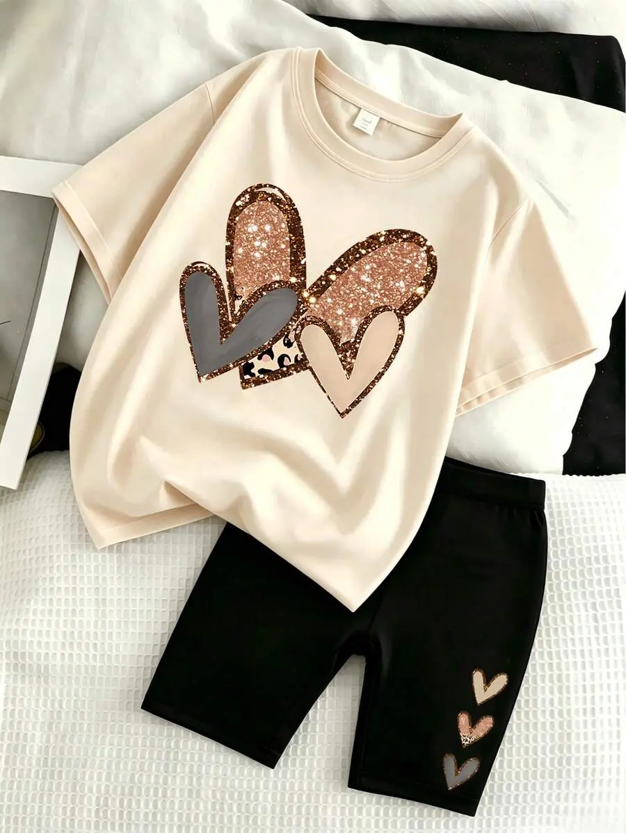 Tween Girls' Summer Set, Beige Short Sleeve T-Shirt Paired With Black Sports Shorts, Heart-Shaped Glitter Print Design, Loose Casual Versatile, Suitable For Daily Wear And School, Back To School