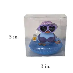Blue Duckie on a floaty with beer