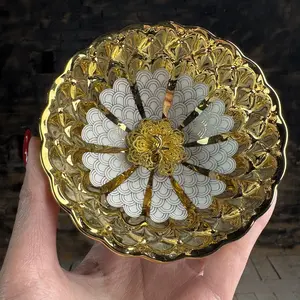 Handmade tea cups with gilded glass inlaid with enamel color