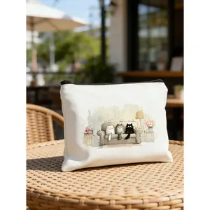 Cute cat print makeup bag, cat-themed makeup bag, cozy living room scene with cats and floral details, portable toiletry bag, travel cosmetic storage bag, perfect gift for girls on birthdays, anniversaries, or Valentine's Day.