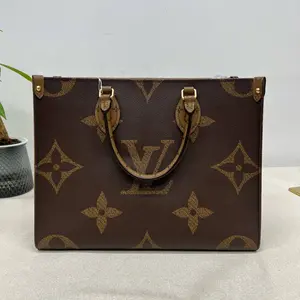 Pre-owned Louis Vuitton Coated Canvas Tote Bags On The Go MM Reversed Monogram