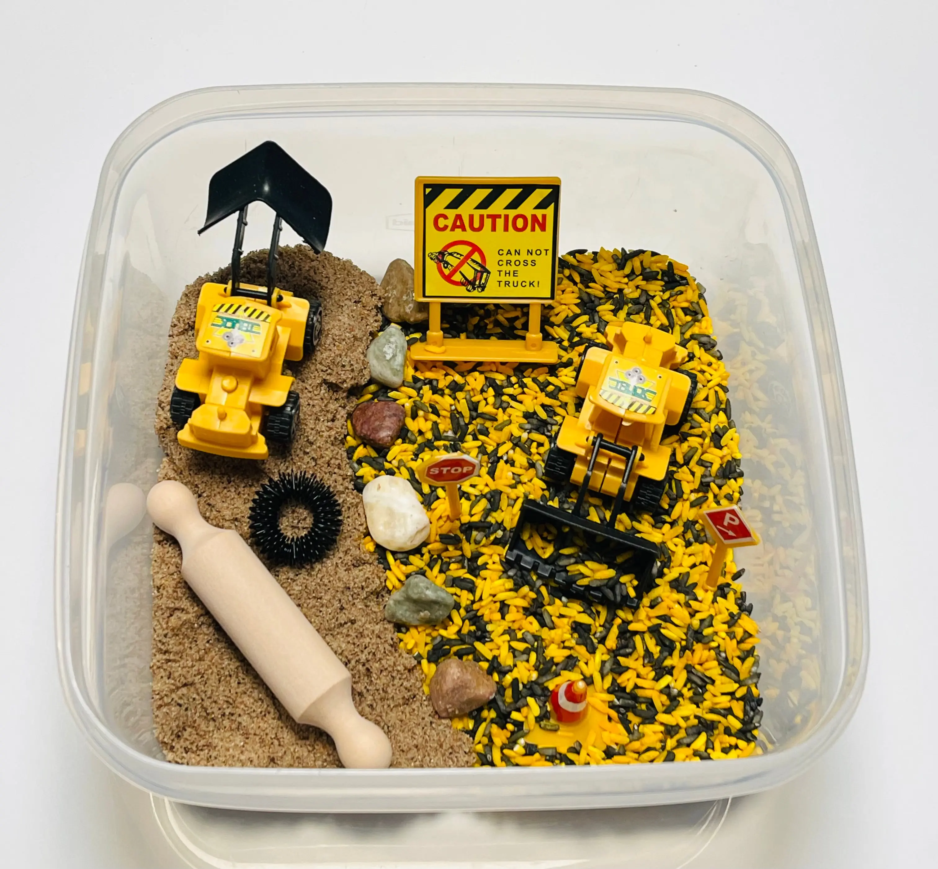 Construction themed sensory rice and kinetic sand kit!