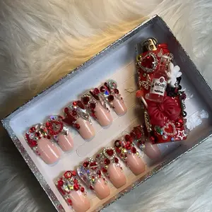 Press on Nails - Set of Red and Pink Nail Art Designs with Decorative Elements, Includes Various Shapes and Styles