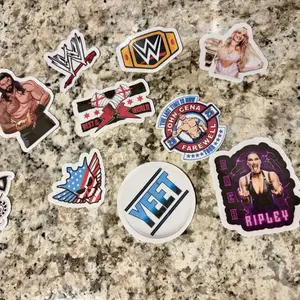 WWE Sticker Bundle Featuring Iconic Characters and Logos Perfect for Collectors and Fans