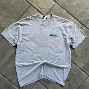 Vintage 90s Quiksilvers Grey Surf Graphic Tee Grail Cotton Crewneck Tee for Vintage Coastal Style and Fall Streetwear, Unisex Crewneck Shirt for Men and Women