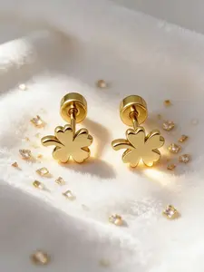 These gold four-leaf clover studs are the ultimate 2026 fashion staple. Sleek, polished, and packed with lucky energy-they elevate every fit, from streetwear to date night. Secure screw-back design, perfect for on-the-go trendsetters.