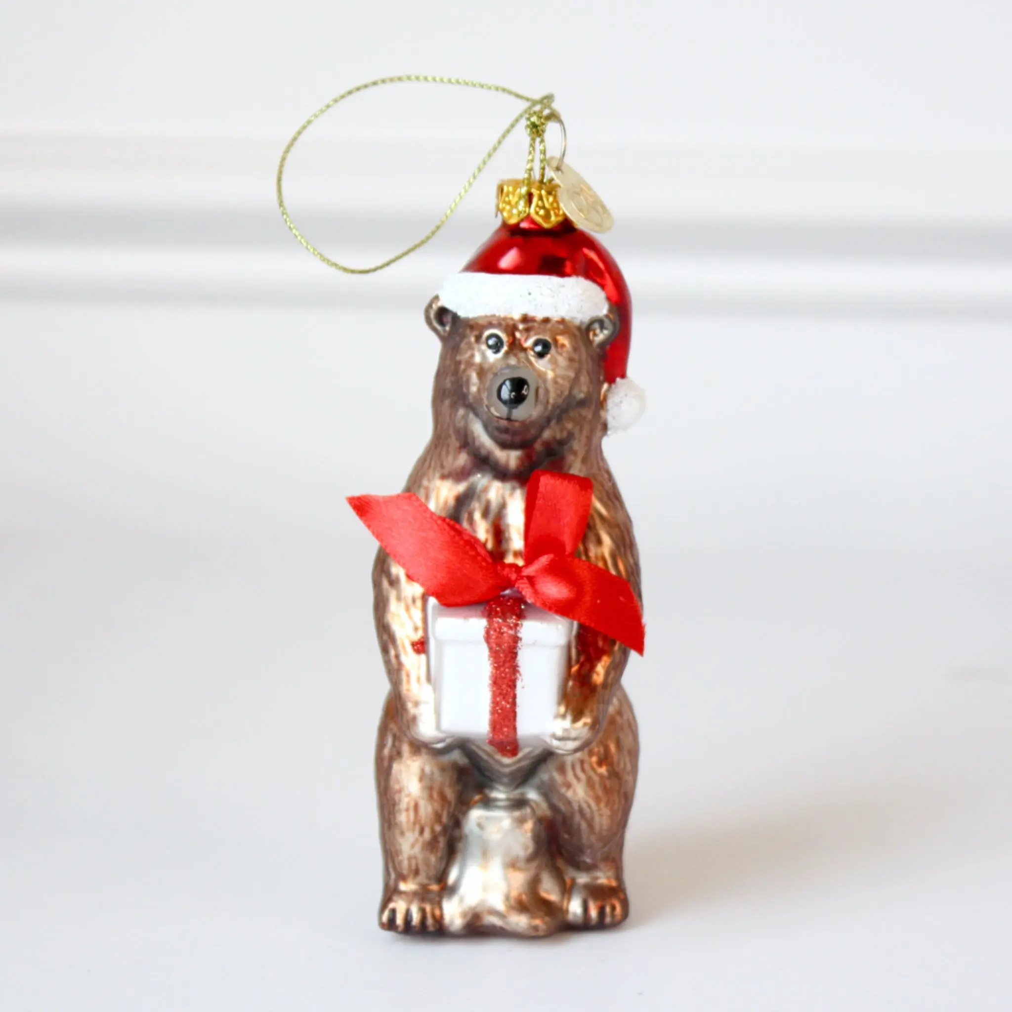 Grizzly Bear with Santa Hat and Present Glass Christmas Ornaments
