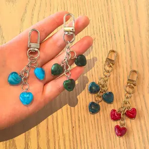 Stylish, Minimalist Transparent Red Fruit U-Shaped Keychain - Compact Resin Sports & Outdoor Accessory Charm