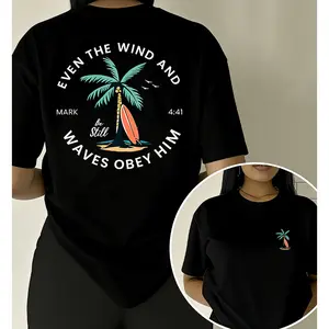 Double-Sided Print Christian Beach Women's Oversized T-Shirt | "Even The Wind And Waves Obey Him" Mark 4:41 Bible Verse Surf Palm Tree Top