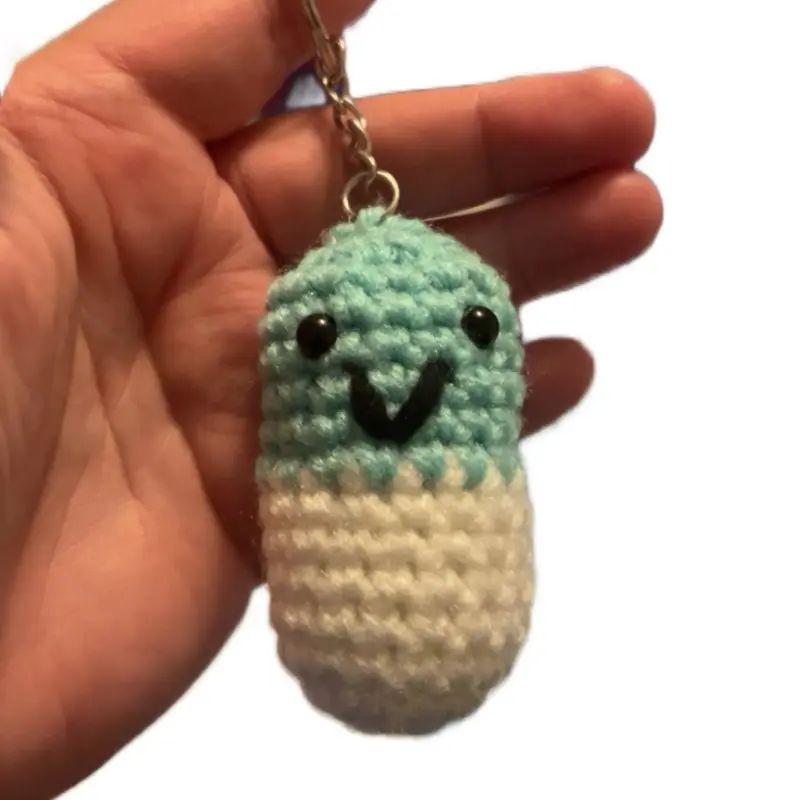 Crochet Happy Pill Keychain - Adorable Blue and White Design with Smiley Face Charm