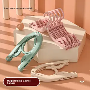 Portable folding clothes hanger for business trips and travel, magic clothes hanger, space-saving, solid color, non-slip, multifunctional mini clothes rack