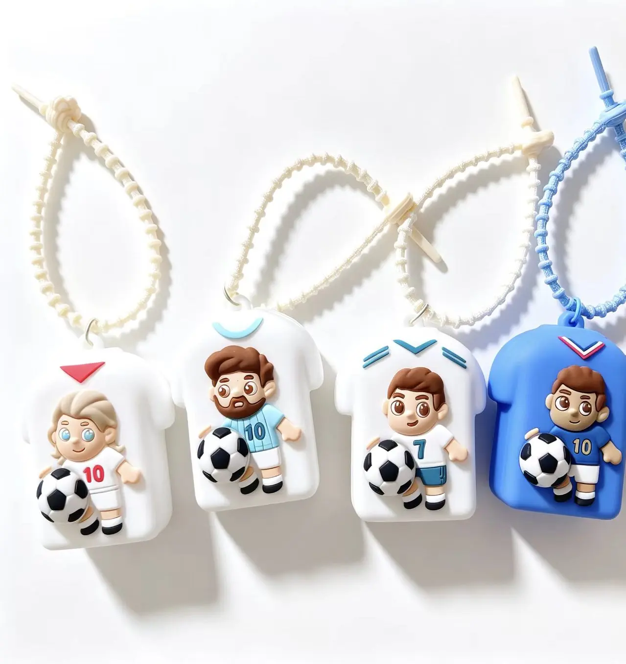 4-Piece Compact & Lightweight Flexible Eco-Friendly Silicone Soccer Jersey Fidget Keychain Toys - Squishy Squeeze Charms for Keys, Backpacks, Sports Enthusiasts, Kids’ Prizes