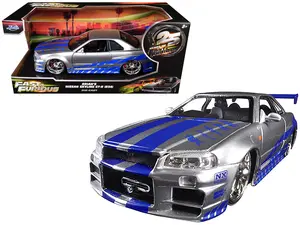 Brian's Nissan GTR Skyline R34 RHD Silver with Blue Stripes "Fast & Furious 25th Anniversary" 1/24 Diecast Model Car by Jada