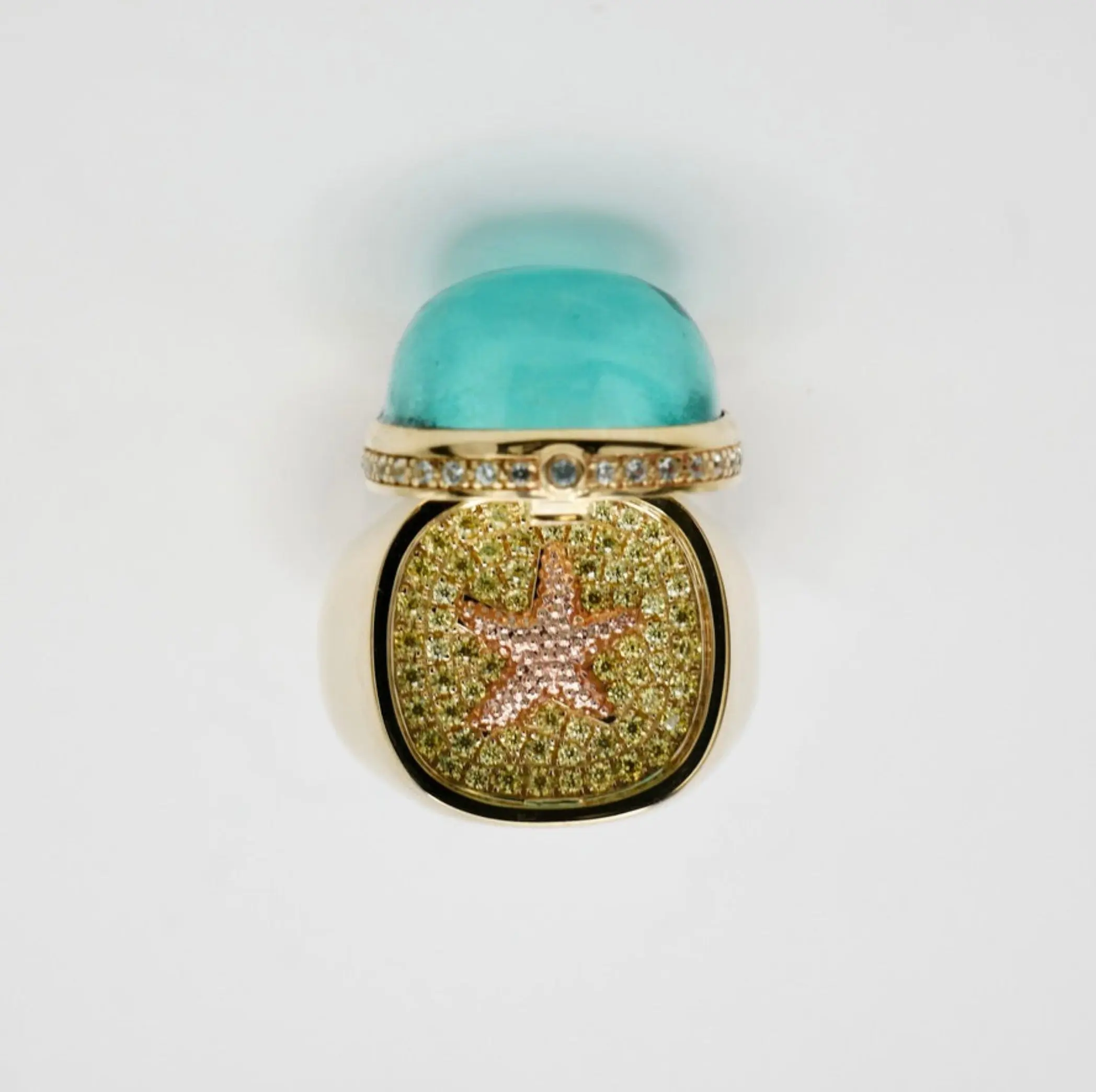 Aquamarine Cabochon Ring with Hidden Opening Starfish