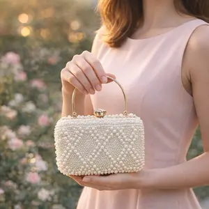 Elegant Pearl-Adorned Clutch Bag with Gold Handle for Special Occasions