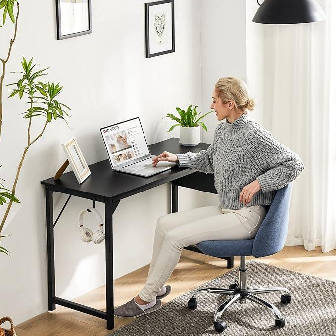 32-Inch Small Computer Office Desk for Kids and Students, perfect for studying and writing. This modern, simple PC table features a storage bag and headphone hooks, making it an ideal addition to any home or bedroom.