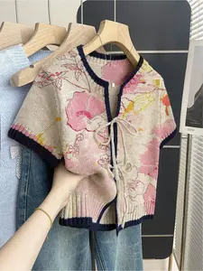 Women's khaki bohemian vacation short-sleeve knit top. Loose round neck, contrast floral print, front tie and contrast piping. Comfortable for spring & summer casual wear.