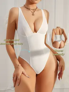 A Form-Fitting White Bodysuit with a Sexy Aesthetic