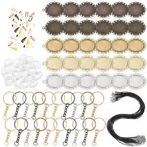 130 piece pendant tray kit, including oval base, transparent patch, hanging rope, keychain, and pendant metal accessories, used for commemorative photos, wedding bouquets, graduation photos, DIY handmade souvenirs