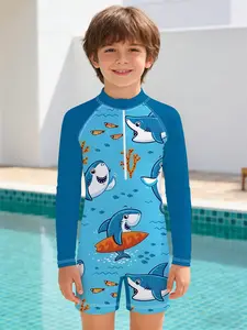 Boys' one-piece swimsuit "Cartoon Surfing Shark Style" with deep sea blue contrasting color ocean-style prints, stand-up collar zipper long-sleeve sun-protective one-piece design, suitable for swimming in the pool / seaside vacation / water park wear