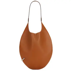 Tory Burch Pierced Soft Bag in Aged Tan