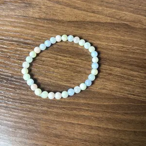 20. Morgenite and Aqua 6MM Round Smooth Bead Natural Crystal Bracelet Colors Will Vary Final Sale