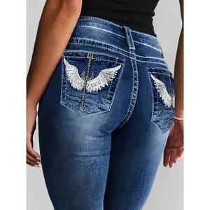 High-Waisted Elastic Jeans for Plus-Size Women in Blue, Featuring Wing And Embroidery on The Pockets, with Flared Legs.They Offer a Retro, Mature, Casual, And Versatile Style, Making Them Suitable for Any Season