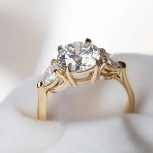 Lab Grown Diamond Three Stone Engagement Ring with Round Center & Pear Side Diamonds in 14K Gold