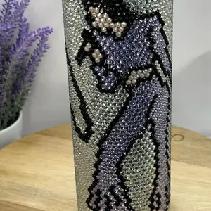 Introducing the dazzling Selena Tejana music rhinestone tumbler! Elevate your drinkware collection with this eye-catching tumbler that sparkles with style and captures the essence of Tejana music. Perfect for any occasion, it's a must-have for both music
